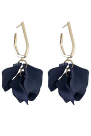 A model wearing the Medium Drop Multi Leaf Earring in colour Navy (Blue), from the front, showing the whole outfit
