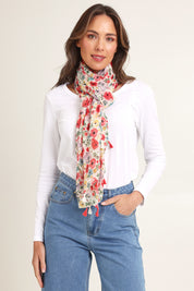 Model Madeline wearing the Poppy Lightweight Scarf in colour Poppy, from the front, showing the whole outfit