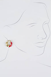 A model wearing size OneSize of the Hoop Earrings in colour Raspberry (Red), from the front, showing the whole outfit