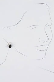 A model wearing size OneSize of the Enamel Drop Earrings in colour Black (Black), from the front, showing the whole outfit