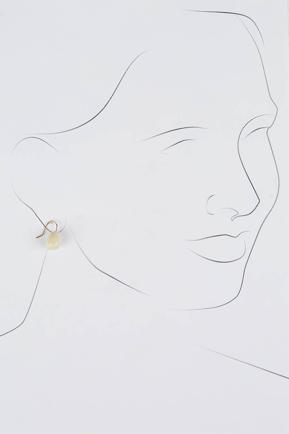 A model wearing size OneSize of the Enamel Drop Earrings in colour White (White), from the front, showing the whole outfit