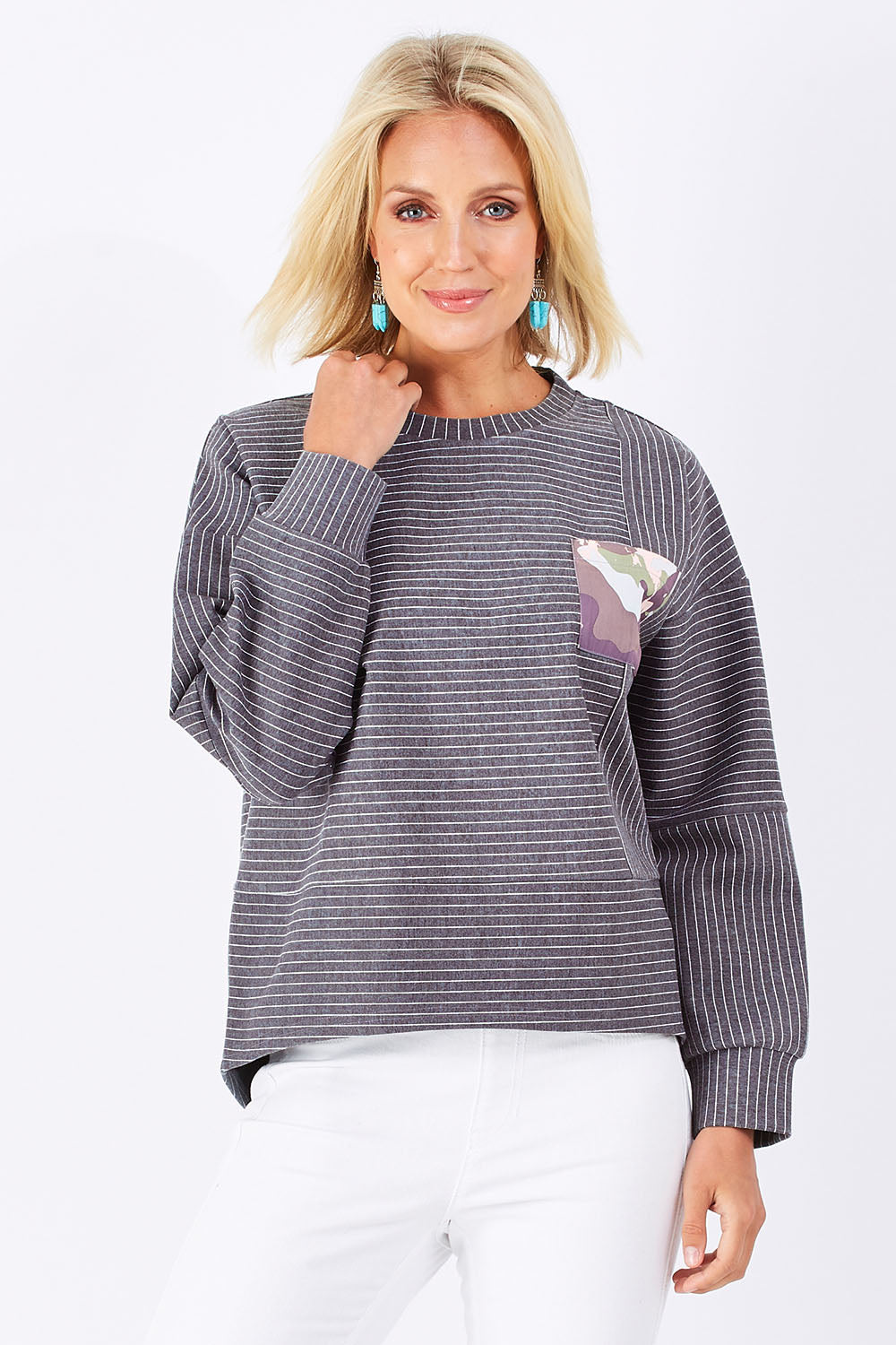 Model Jude wearing size 10 of the Contrast Stripe Sweater in colour Pockets (Grey), from the front, showing the whole outfit