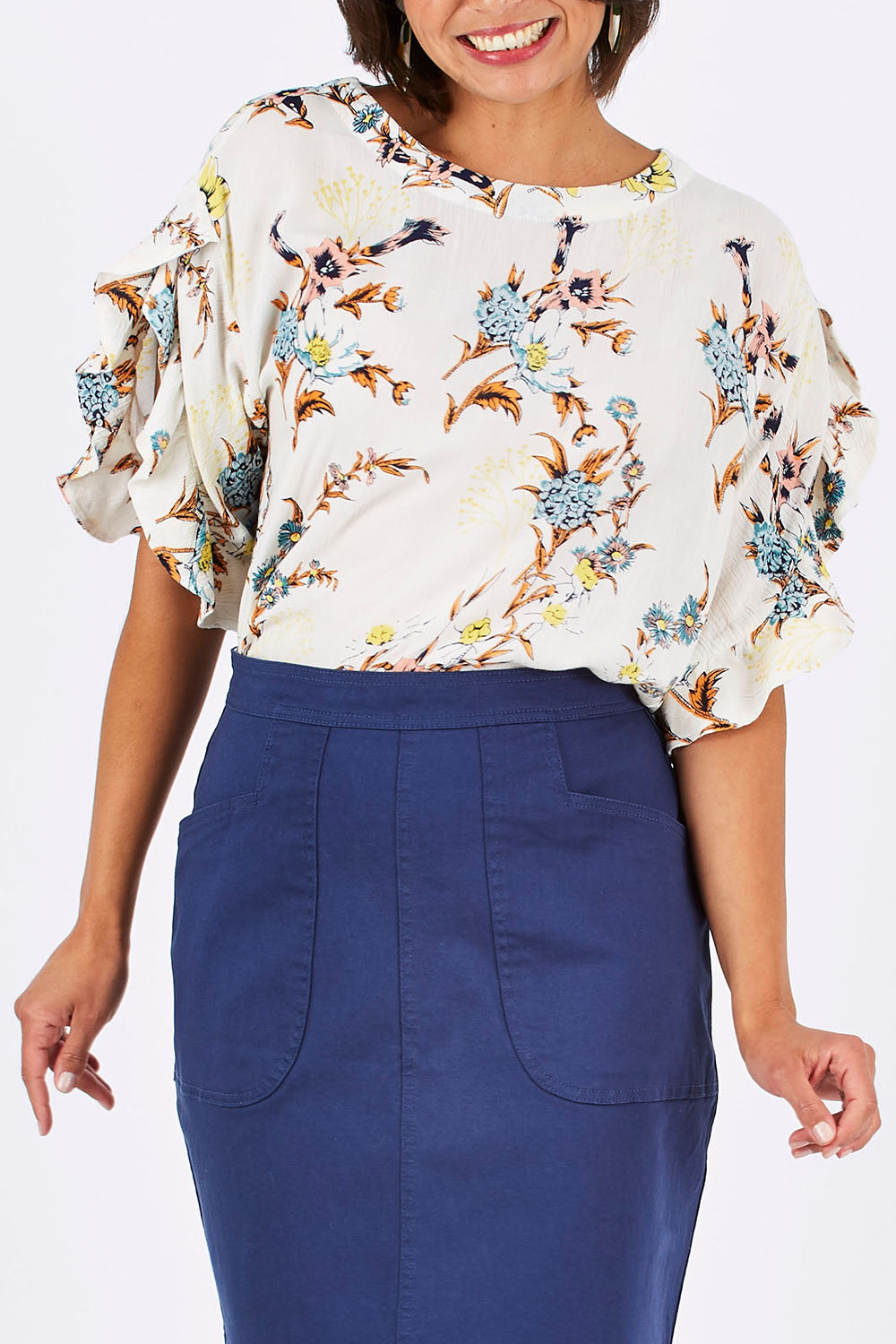 Model Thais wearing size 10 of the Soft Sleeve Top in colour Trumpet (White), from the front, cropped image