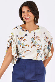 Model Thais wearing size 10 of the Soft Sleeve Top in colour Trumpet (White), from the front, cropped image