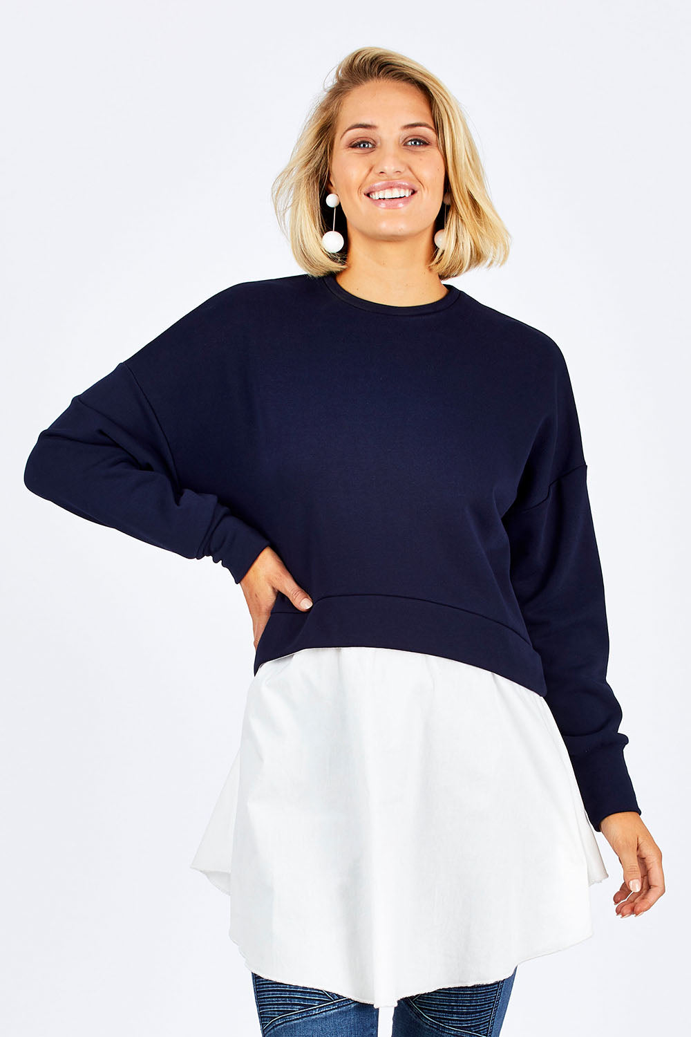 Model Emma wearing size 10 of the Weekend Tunic in colour Navy (Blue), from the front, cropped image