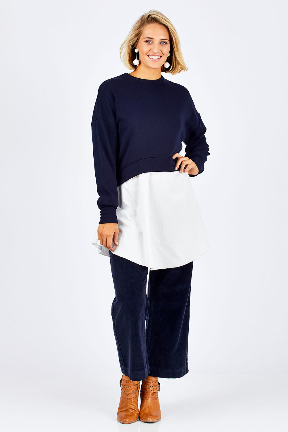 Model Emma wearing size 10 of the Weekend Tunic in colour Navy (Blue), from the front, showing the whole outfit