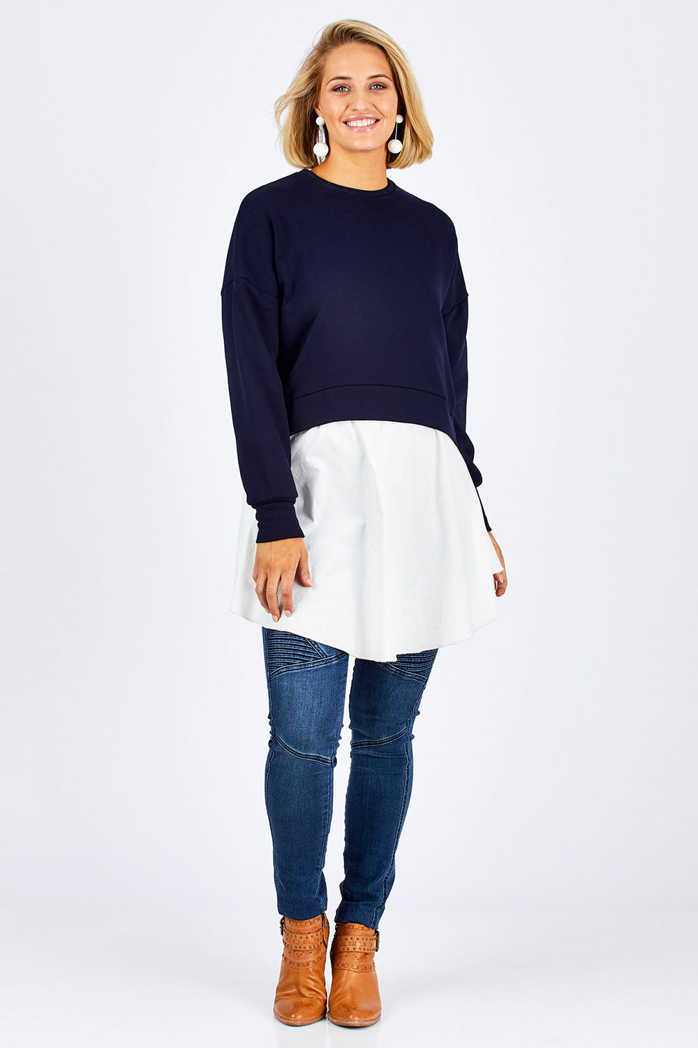 Model Emma wearing size 10 of the Weekend Tunic in colour Navy (Blue), from the front, showing the whole outfit