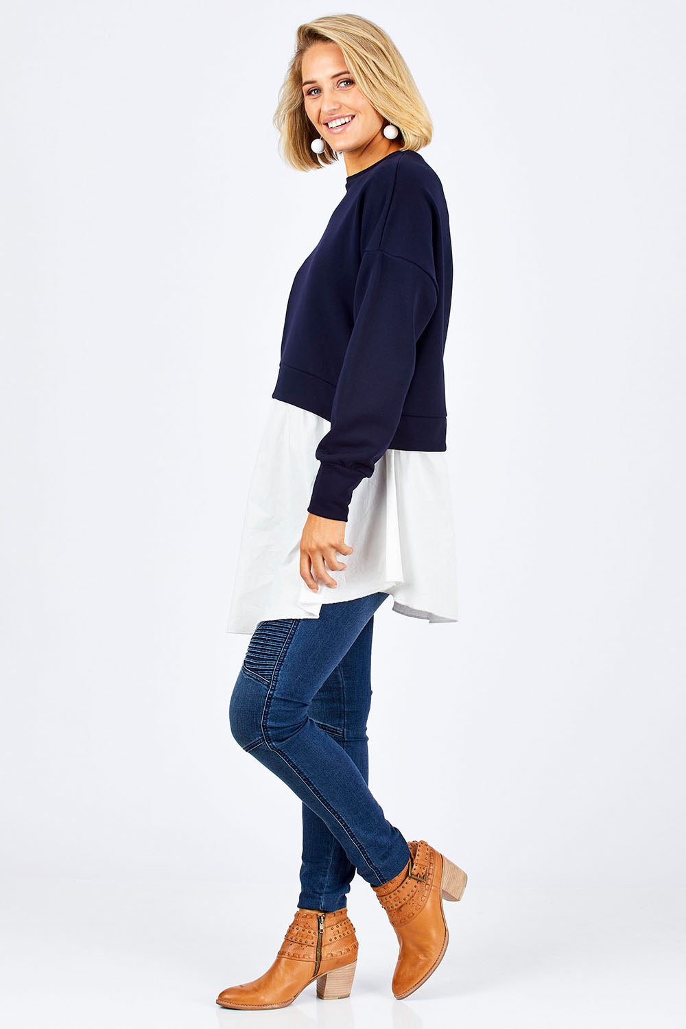 Model Emma wearing size 10 of the Weekend Tunic in colour Navy (Blue), from the front, showing the whole outfit