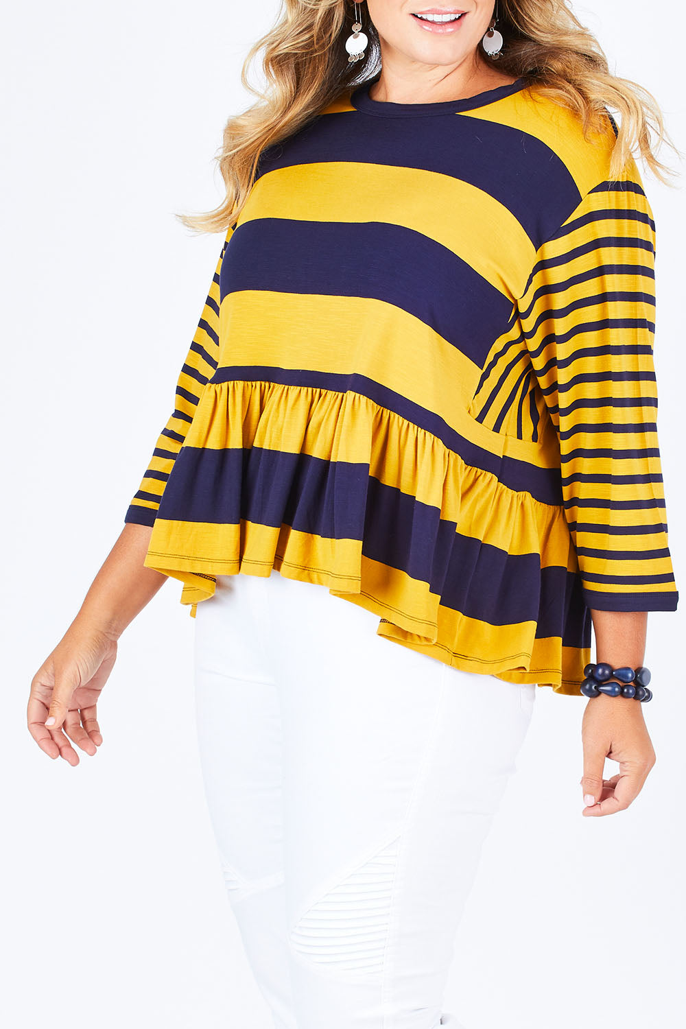 Model Fiona wearing size 16 of the Hem Frill Stripe Top in colour SoFrilled (Blue), from the front, cropped image