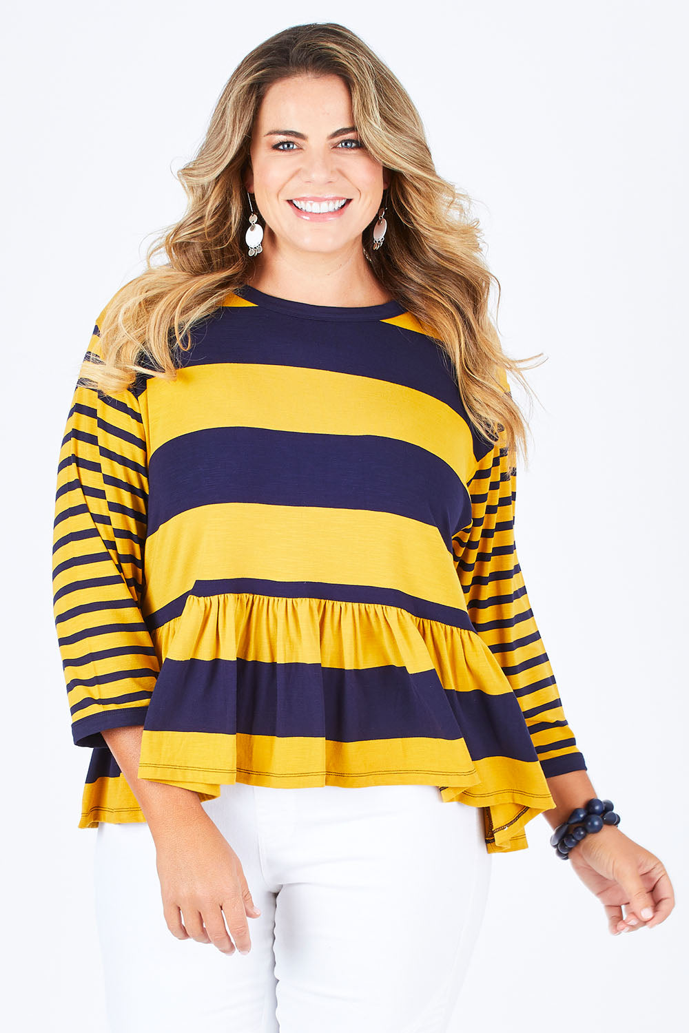 Model Fiona wearing size 16 of the Hem Frill Stripe Top in colour SoFrilled (Blue), from the front, cropped image