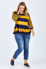 Model Jess wearing size 14 of the Hem Frill Stripe Top in colour SoFrilled (Blue), from the front, showing the whole outfit