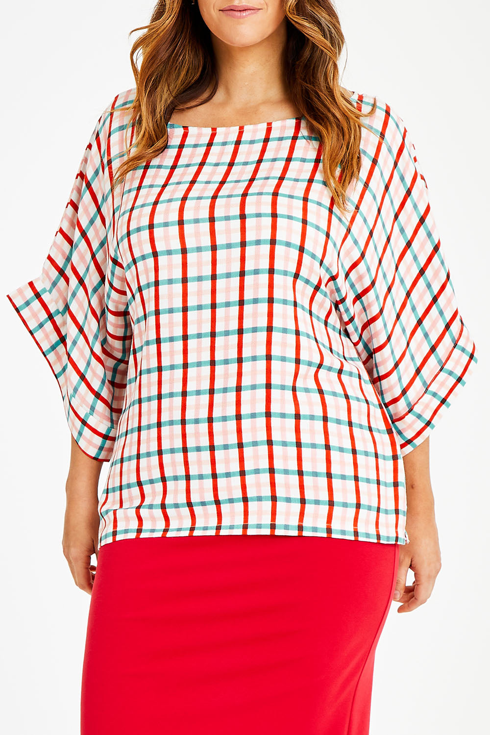 Model Laura wearing size 14 of the Tie Back Bell Sleeve Top in colour Check (White), from the front, cropped image