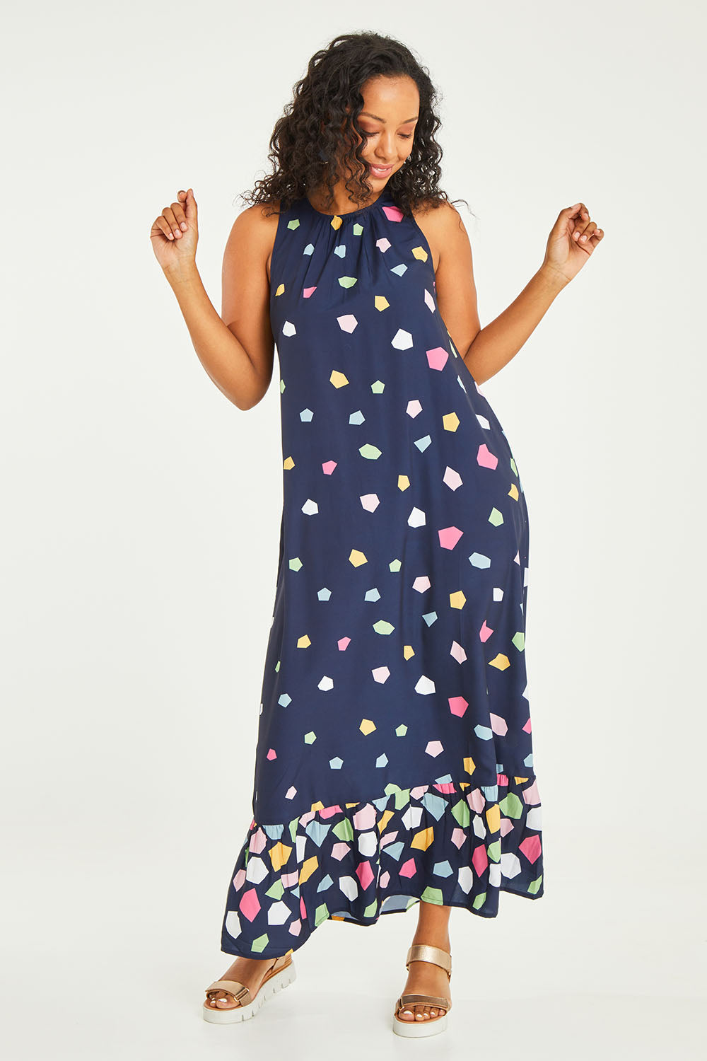 Model Noli wearing size 14 of the Falling Bricks Maxi in colour Jigsaw (Blue), from the front, showing the whole outfit