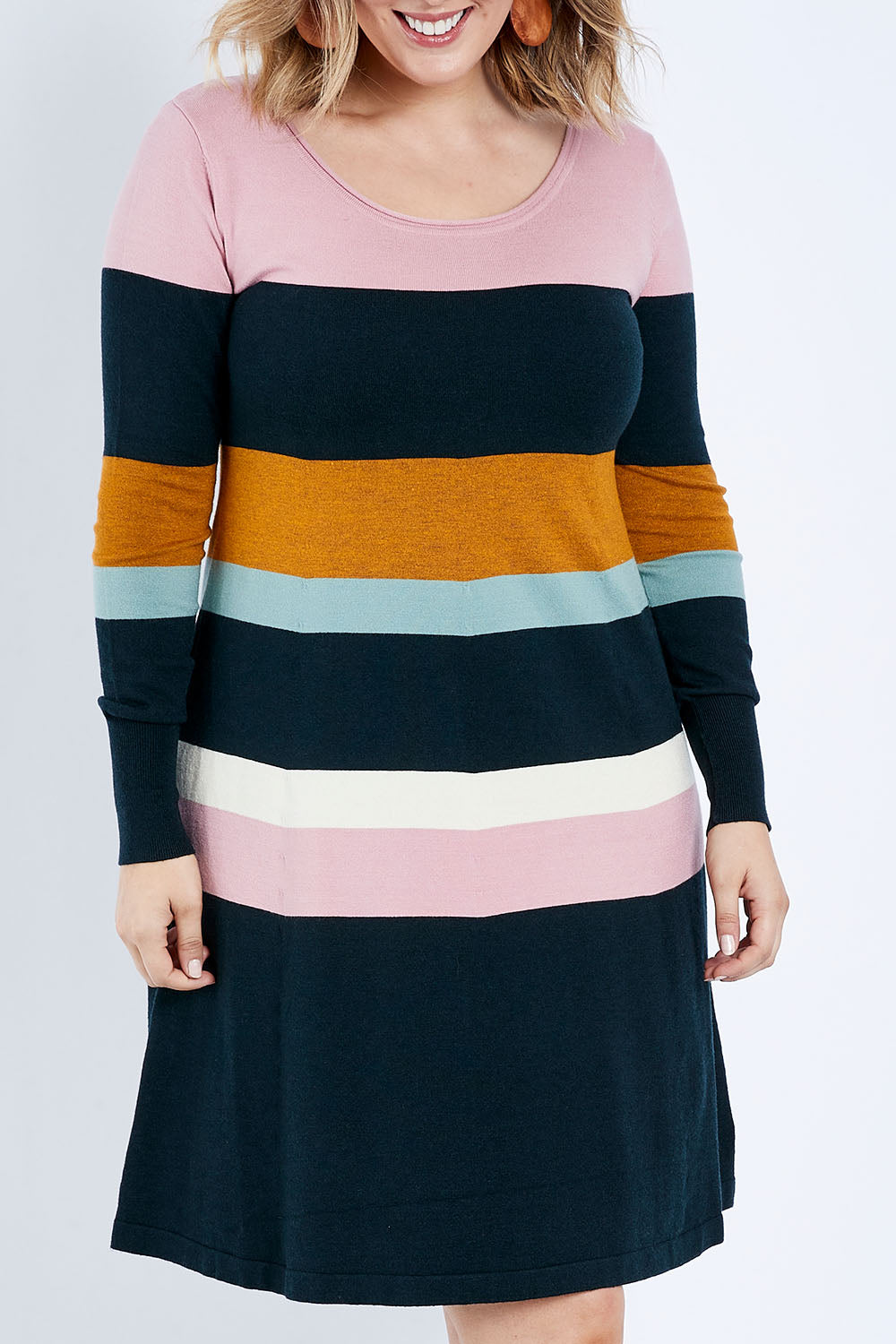 Model Jess wearing size L of the Knit Stripe Dress in colour Mixstripe (Green), from the front, cropped image