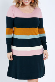 Model Jess wearing size L of the Knit Stripe Dress in colour Mixstripe (Green), from the front, cropped image