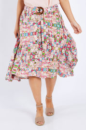 Model Laura wearing size 14 of the Belted Button Skirt in colour Patchmeup (Pink), from the front, cropped image