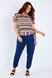 Model Laura wearing size 14 of the Striped Tie Waist Top in colour Tribal (Blue), from the front, showing the whole outfit