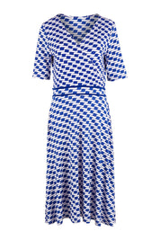 Product shot of the Printed Short Sleeve Faux Wrap Dress in colour Waves (Blue), from the front