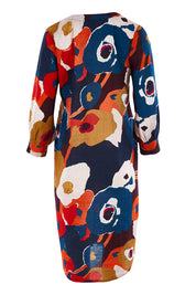 Product shot of the Long Sleeve Relaxed Fit Dress in colour Autfloral (Blue), from the back