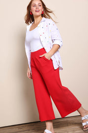 Model Georgiel wearing size 10 of the Wide Leg Ponte Pant – Brightred in colour Brightred, from the front