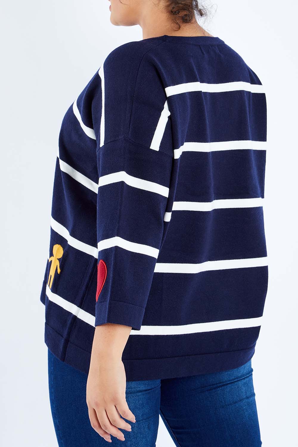 Model Sasha-Lee wearing size XL of the Together Sweater in colour Together (Blue), from the back