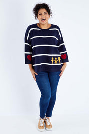 Model Sasha-Lee wearing size XL of the Together Sweater in colour Together (Blue), from the front, showing the whole outfit