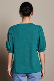Model Katie wearing size 10 of the Gathered Sleeve Top in colour Jade (Green), from the back