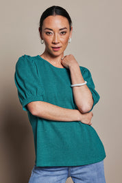 Model Katie wearing size 10 of the Gathered Sleeve Top in colour Jade (Green), from the front, cropped image