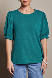 Model Katie wearing size 10 of the Gathered Sleeve Top in colour Jade (Green), from the front, cropped image
