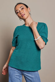 Model Katie wearing size 10 of the Gathered Sleeve Top in colour Jade (Green), from the front, cropped image