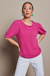 Model Katie wearing size 10 of the Gathered Sleeve Top in colour Magenta (Pink), from the front, cropped image