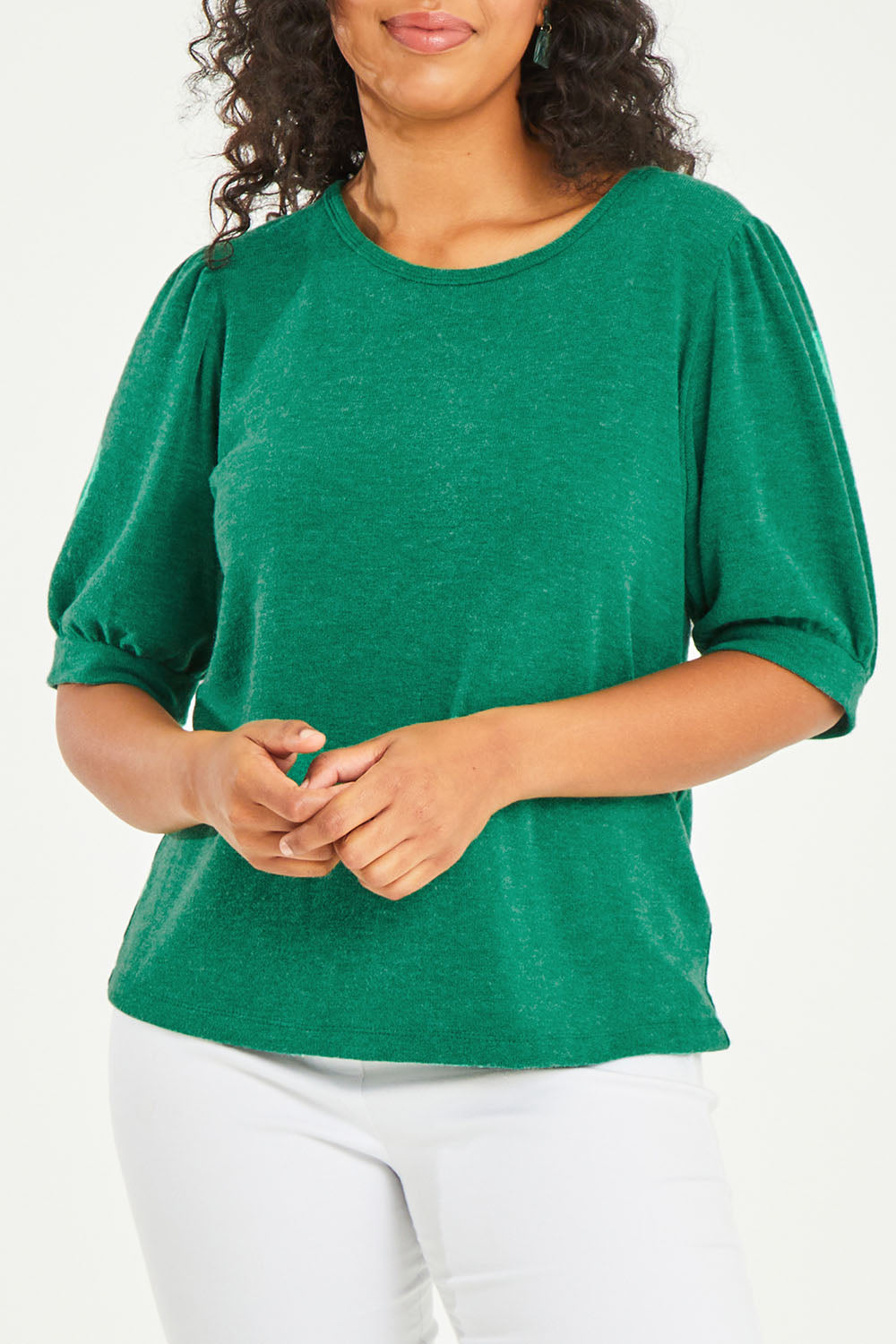 Model Noli wearing size 14 of the Gathered Sleeve Top in colour Vividgreen (Green), from the front, cropped image