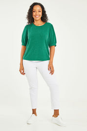 Model Noli wearing size 14 of the Gathered Sleeve Top in colour Vividgreen (Green), from the front, showing the whole outfit