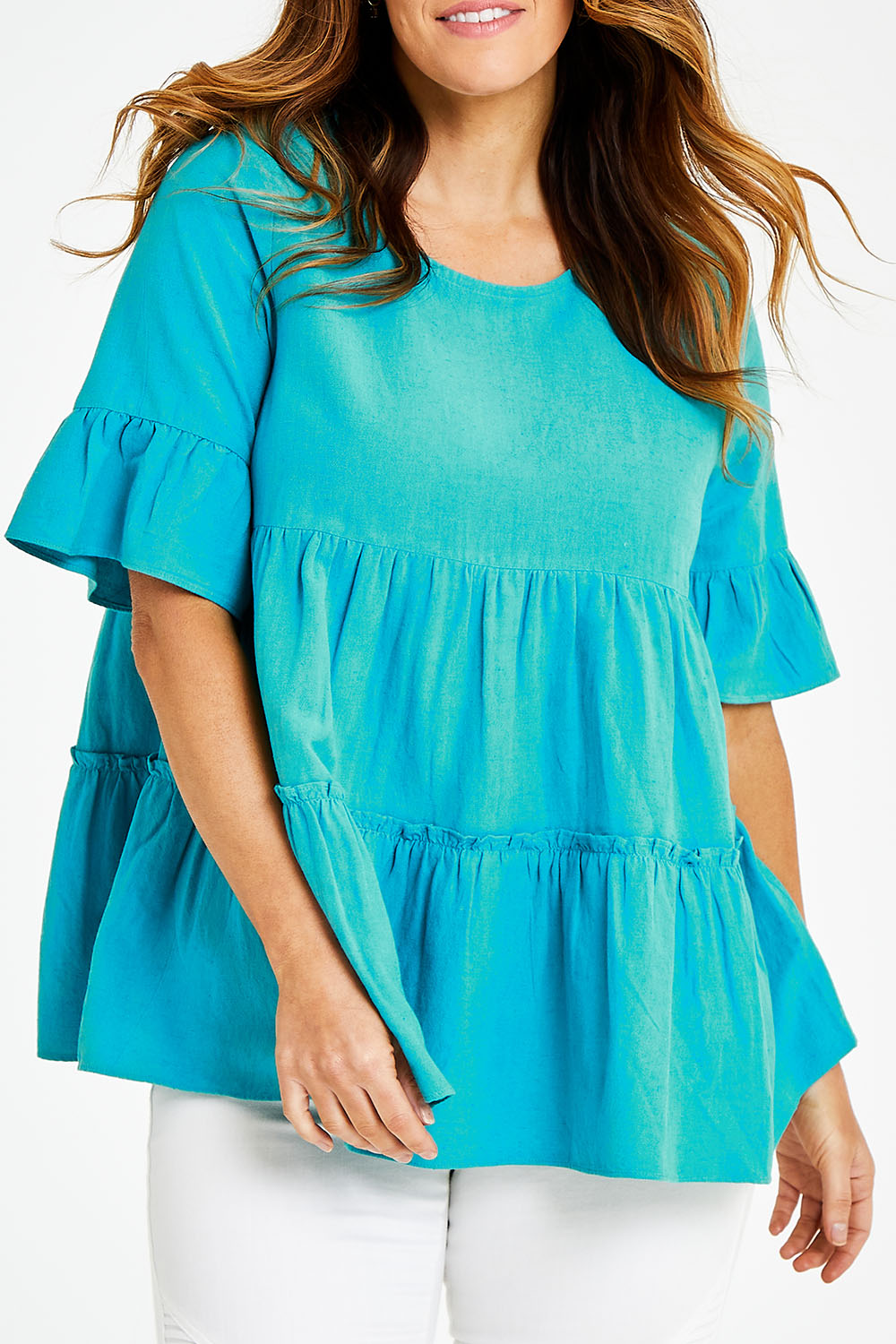 Model Laura wearing size 14 of the Linen Blend Tiered Top in colour Aqua (Blue), from the front, cropped image