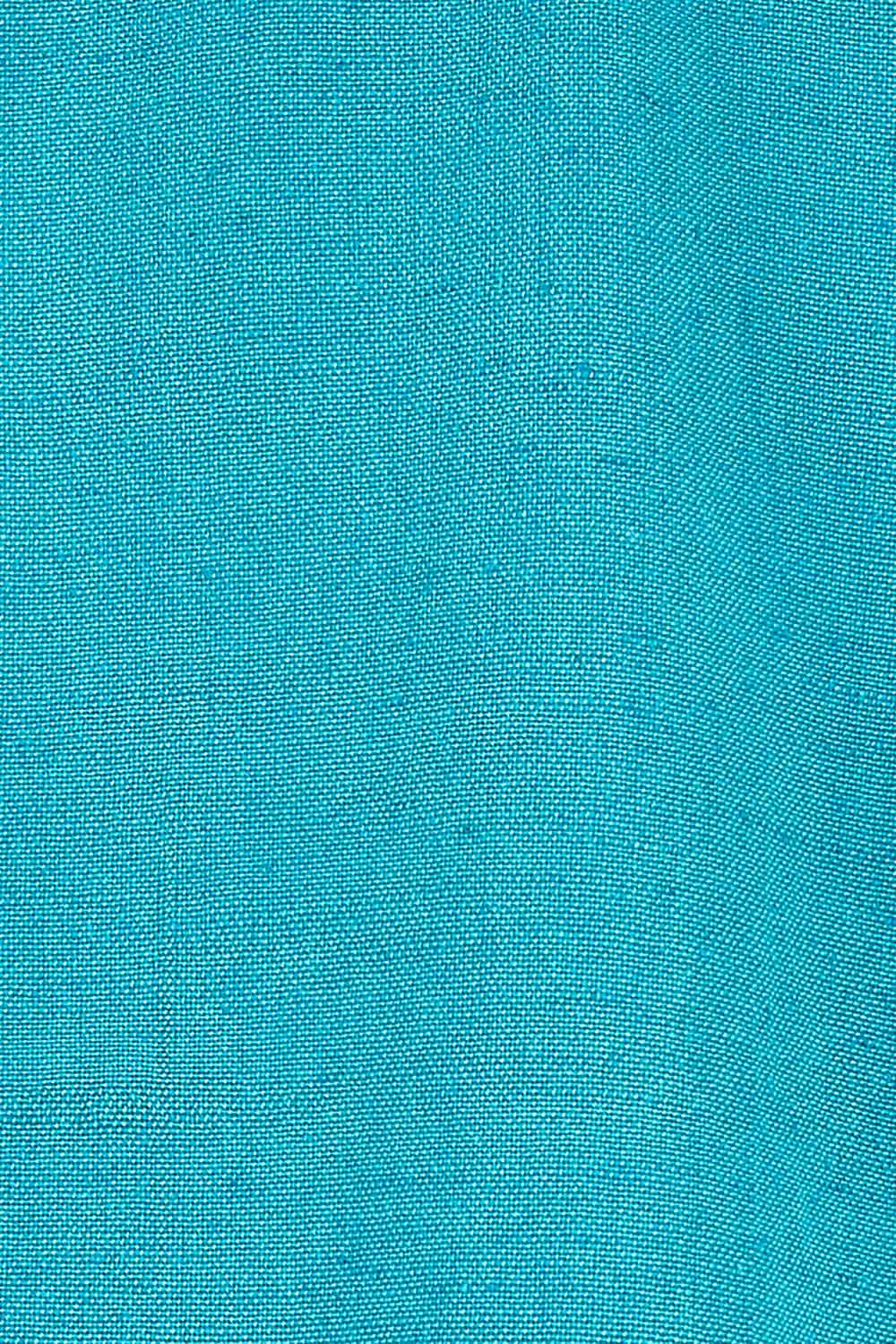 Product shot of the Linen Blend Tiered Top in colour Aqua (Blue), detail