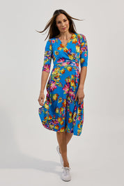 Model Amanda wearing size 10 of the Printed 3/4 Sleeve Faux Wrap Dress in colour Garden (Blue), from the front, showing the whole outfit