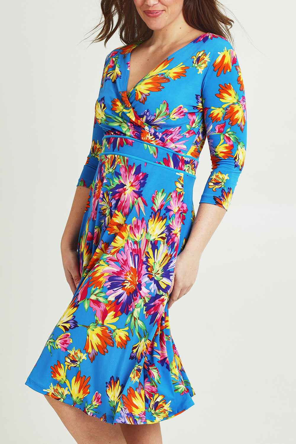 Model Jane wearing size 14 of the Printed 3/4 Sleeve Faux Wrap Dress in colour Garden (Blue), from the front, cropped image