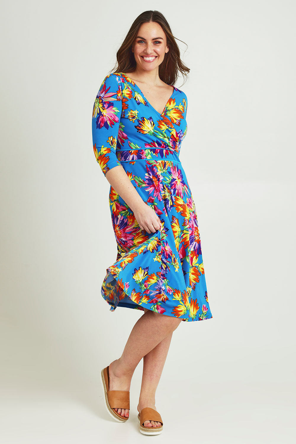 Model Jane wearing size 14 of the Printed 3/4 Sleeve Faux Wrap Dress in colour Garden (Blue), from the front, showing the whole outfit