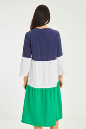 Model Stacey wearing size 10 of the Multi Colour Tier Dress in colour Multi (Blue), from the back
