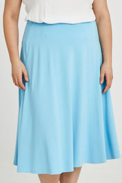 Model Keeara wearing size 16 of the Gathered Waist Long Skirt in colour Skyblue (Blue), from the front, cropped image