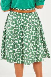 Model Noli wearing size 14 of the Calf Length Gathered Skirt in colour Daisy (Green), from the back