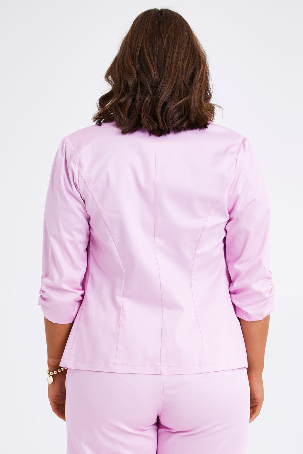 Model Monique wearing size 14 of the Buttoned Blazer in colour Softpink (Pink), from the back