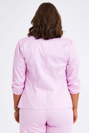 Model Monique wearing size 14 of the Buttoned Blazer in colour Softpink (Pink), from the back