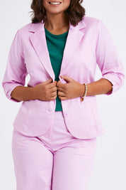 Model Monique wearing size 14 of the Buttoned Blazer in colour Softpink (Pink), from the front, cropped image