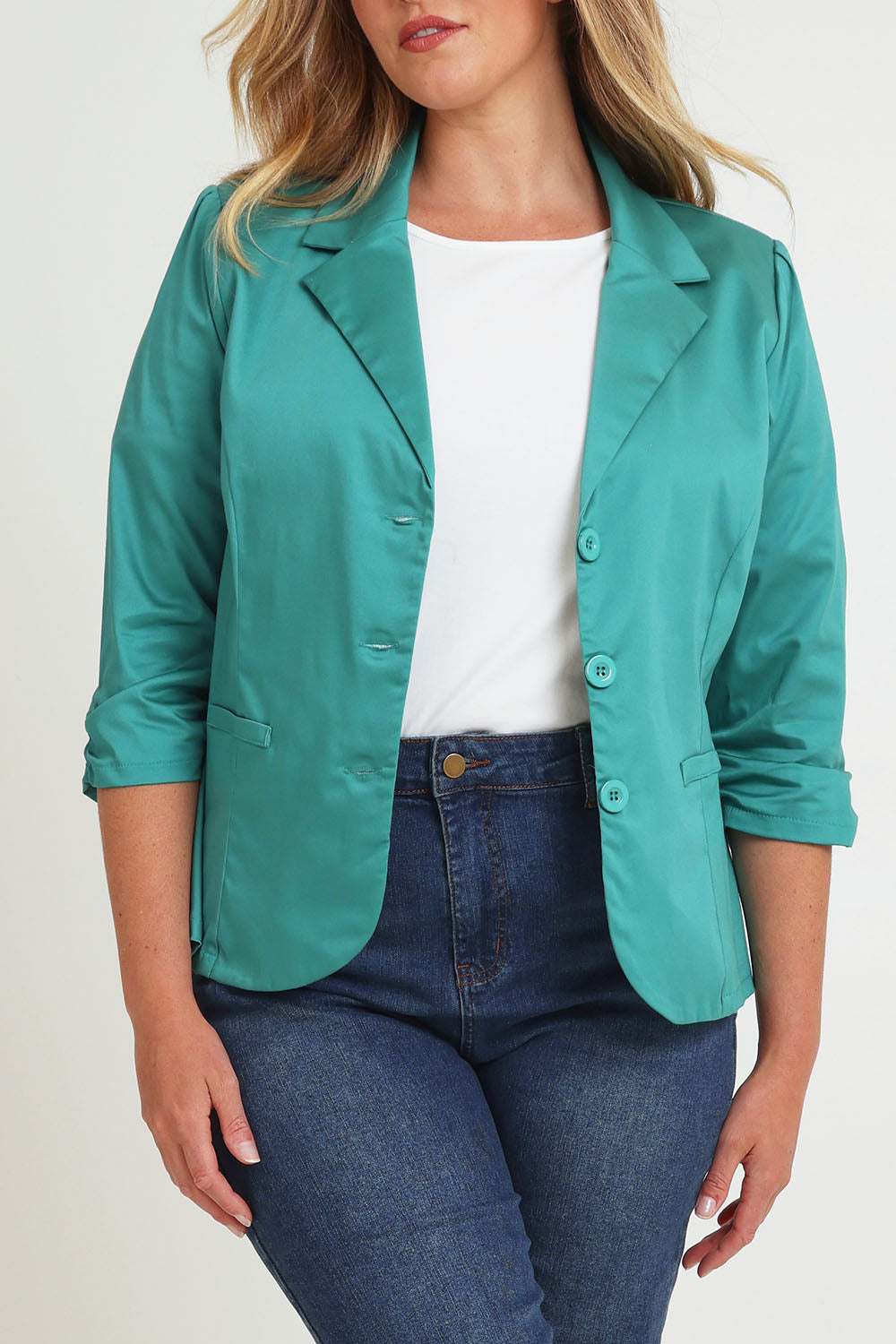 Model Chanel wearing size 16 of the Buttoned Blazer in colour Teal (Blue), from the back