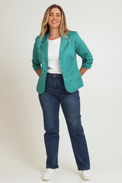 Model Chanel wearing size 16 of the Buttoned Blazer in colour Teal (Blue), from the front, showing the whole outfit