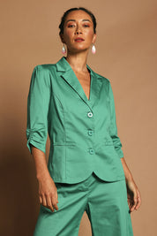 Model Katie wearing size 10 of the Buttoned Blazer in colour Teal (Blue), from the front, showing the whole outfit