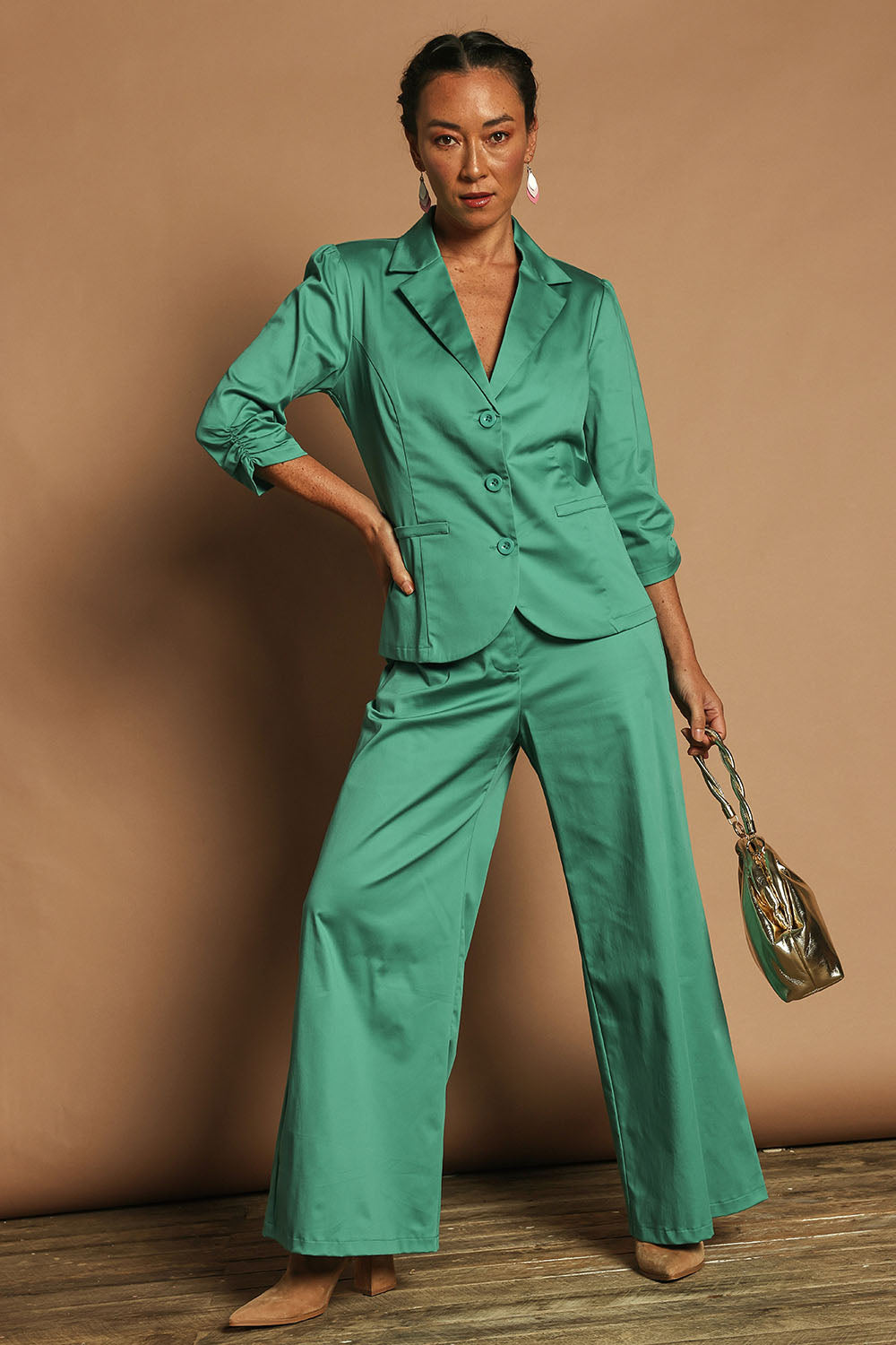 Model Katie wearing size 10 of the Buttoned Blazer in colour Teal (Blue), from the front, showing the whole outfit
