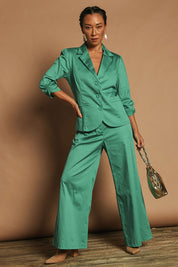 Model Katie wearing size 10 of the Buttoned Blazer in colour Teal (Blue), from the front, showing the whole outfit