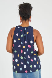 Model Noli wearing size 14 of the Sleeveless Tank in colour Jigsaw (Blue), from the back